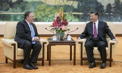 Chủ tịch Trung Quốc Tập Cận Bình (phải) và Ngoại trưởng Mỹ Mike Pompeo hội đàm hôm 14/6. Ảnh: Kyodo News.