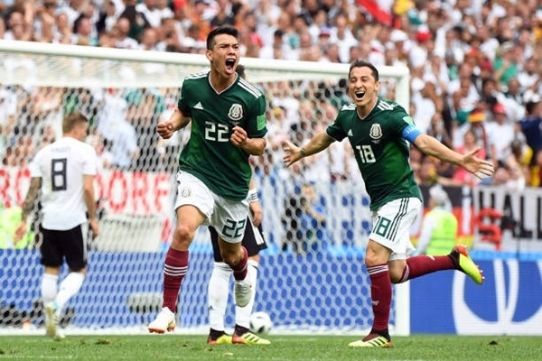 Lozano (số 22) ghi bàn duy nhất giúp Mexico hạ gục Đức. Ảnh: AFP.