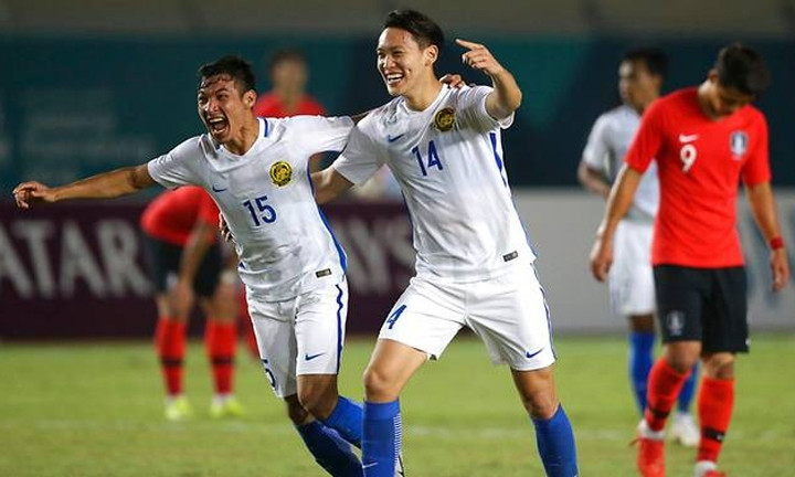 Malaysia chắc chắn đứng đầu bảng E và sẽ gặp đội nhì bảng D - bảng đấu có Việt Nam - ở vòng 1/8. Ảnh: AP.