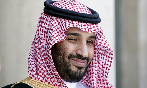 Saudi Arabias then Deputy Crown Prince Mohammed bin Salman reacts upon his arrival at the Elysee Palace in Paris, France, June 24, 2015.