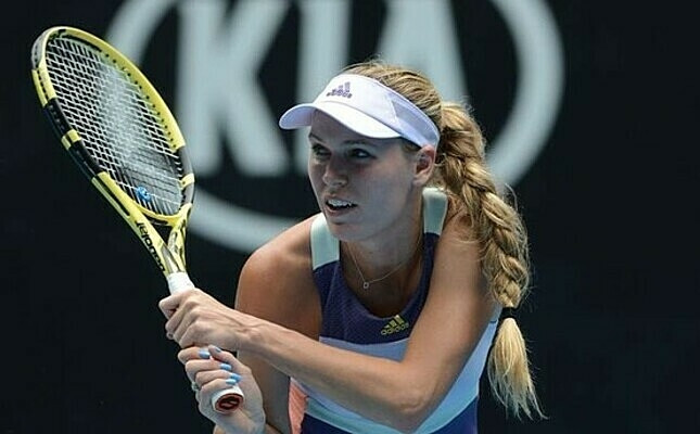 Wozniacki chấm dứt 15 thi đấu trên WTA Tour. Ảnh: AP.