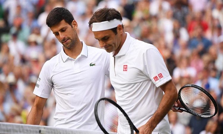 Federer đang lép vé Djokovic về thành tích đối đầu chung cuộc, lẫn đối đầu ở Australia Mở rộng. Ảnh: Reuters.