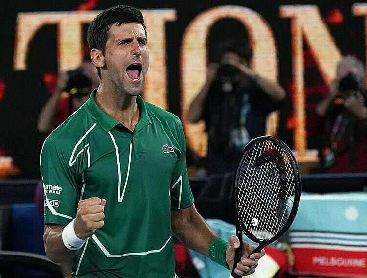 Djokovic thắng 11 trong 17 lần gặp Federer ở Grand Slam. Ảnh: AP.
