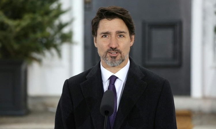 Justin Trudeau họp báo tại nhà ở Ottawa ngày 20/3. Ảnh: AFP.