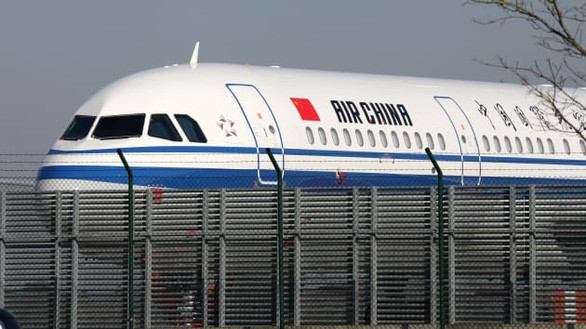Mỹ cấm chuyến bay thương mại Trung Quốc từ 16-6 - Ảnh 1.