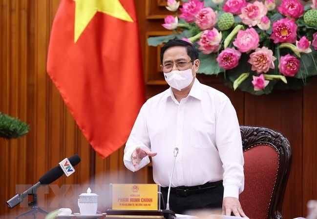 Quyet liet, than toc hon de co du vaccine som tiem phong dien rong hinh anh 1