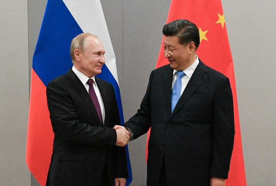 Tổng thống Nga Vladimir Putin và Chủ tịch Trung Quốc Tập Cận Bình trong cuộc gặp ở Brazil hồi tháng 11/2019. Ảnh: Reuters