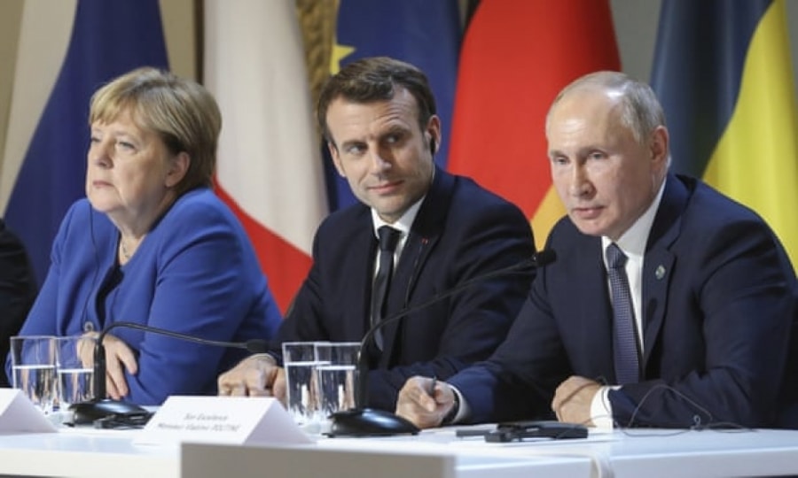 Từ trái sang phải: Thủ tướng Đức Angela Merkel, Tổng thống Pháp Emmanuel Macron và Tổng thống Nga Vladimir Putin. Ảnh: AP