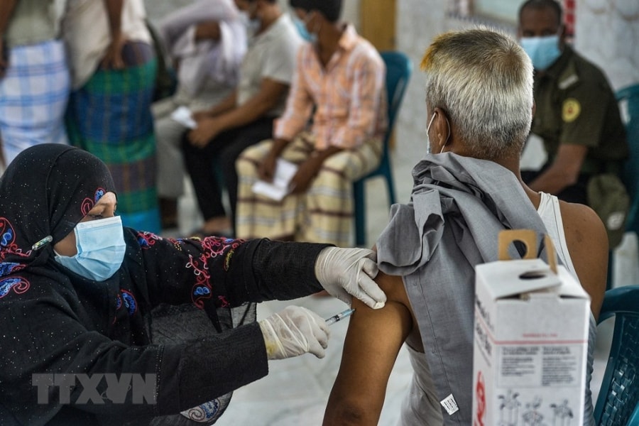 WHO hoi thuc cham dut tinh trang “bat binh dang” ve tiep can vaccine hinh anh 1