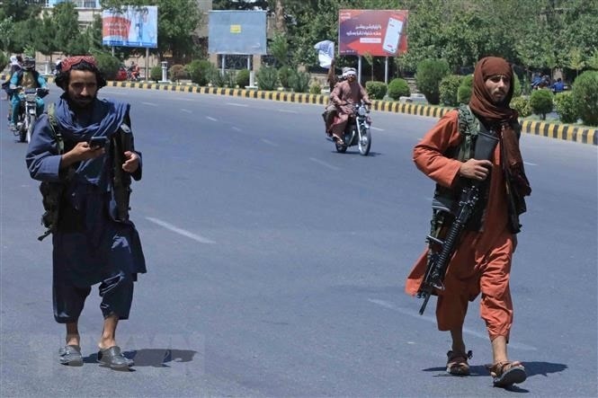 Quan Taliban bat dau tien vao thu do cua Afghanistan tu moi nga hinh anh 1