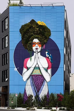 Nghệ sĩ đường phố gây sốt với tranh tường cao ngất - Ảnh 1.
