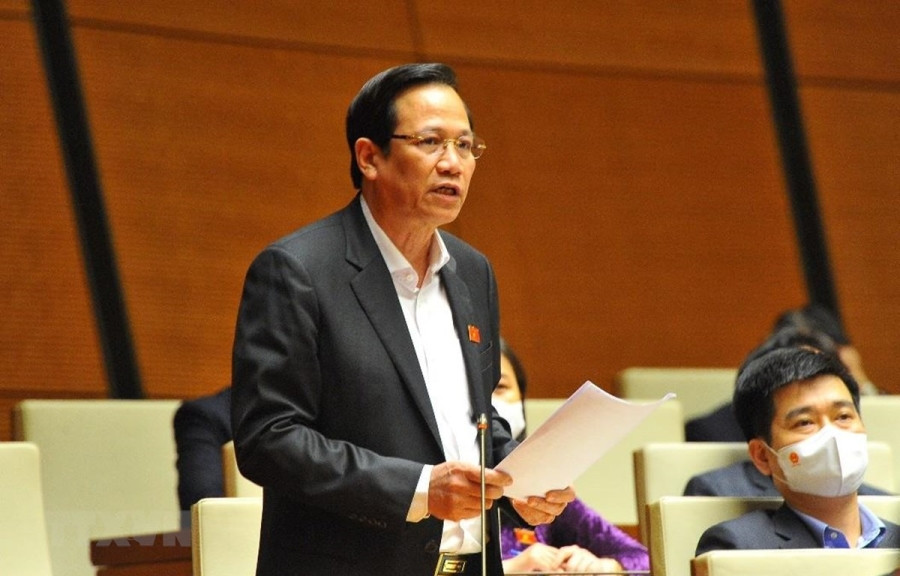 Bộ trưởng Bộ Lao động-Thương binh và Xã hội Đào Ngọc Dung phát biểu giải trình, làm rõ một số vấn đề đại biểu Quốc hội nêu. (Ảnh: Minh Đức/TTXVN)