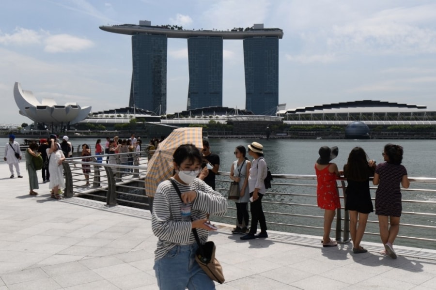 Du khách tại Singapore 17/2/2022 (Nguồn : AFP)