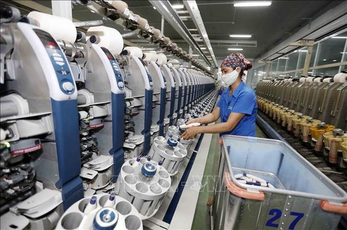 Nhà máy sợi Hòa Xá, Tổng Công ty Cổ phần dệt may Nam Định, một trong những đơn vị đầu ngành về sản xuất sợi cho thị trường trong nước và xuất khẩu. Ảnh: Trần Việt/TTXVN