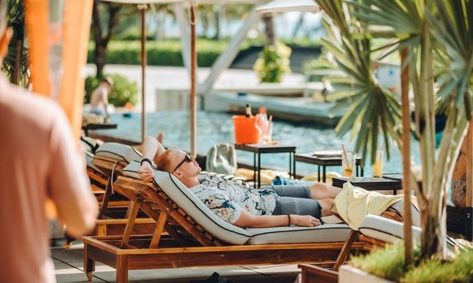 Tourists enjoy at a lounge bar of Sailing Club along Long Beach in Phu Quoc. Photo courtesy of Sailing Club