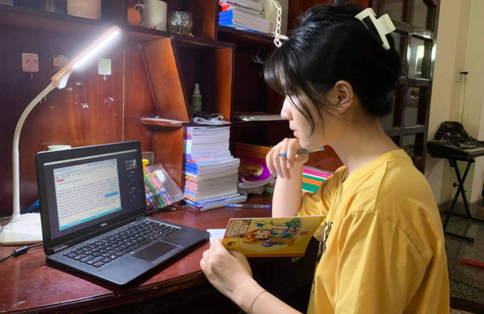 Học sinh trường THCS - THPT Đào Duy Anh, TP HCM học trực tuyến hồi tháng 9/2021. Ảnh: Nhà trường cung cấp