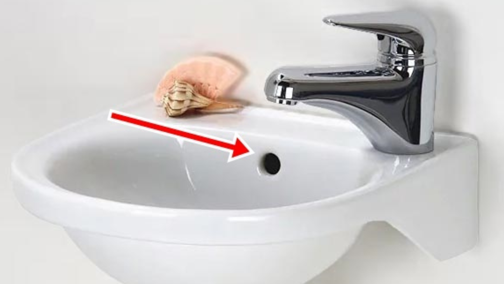 Why do sinks usually have a small round hole?