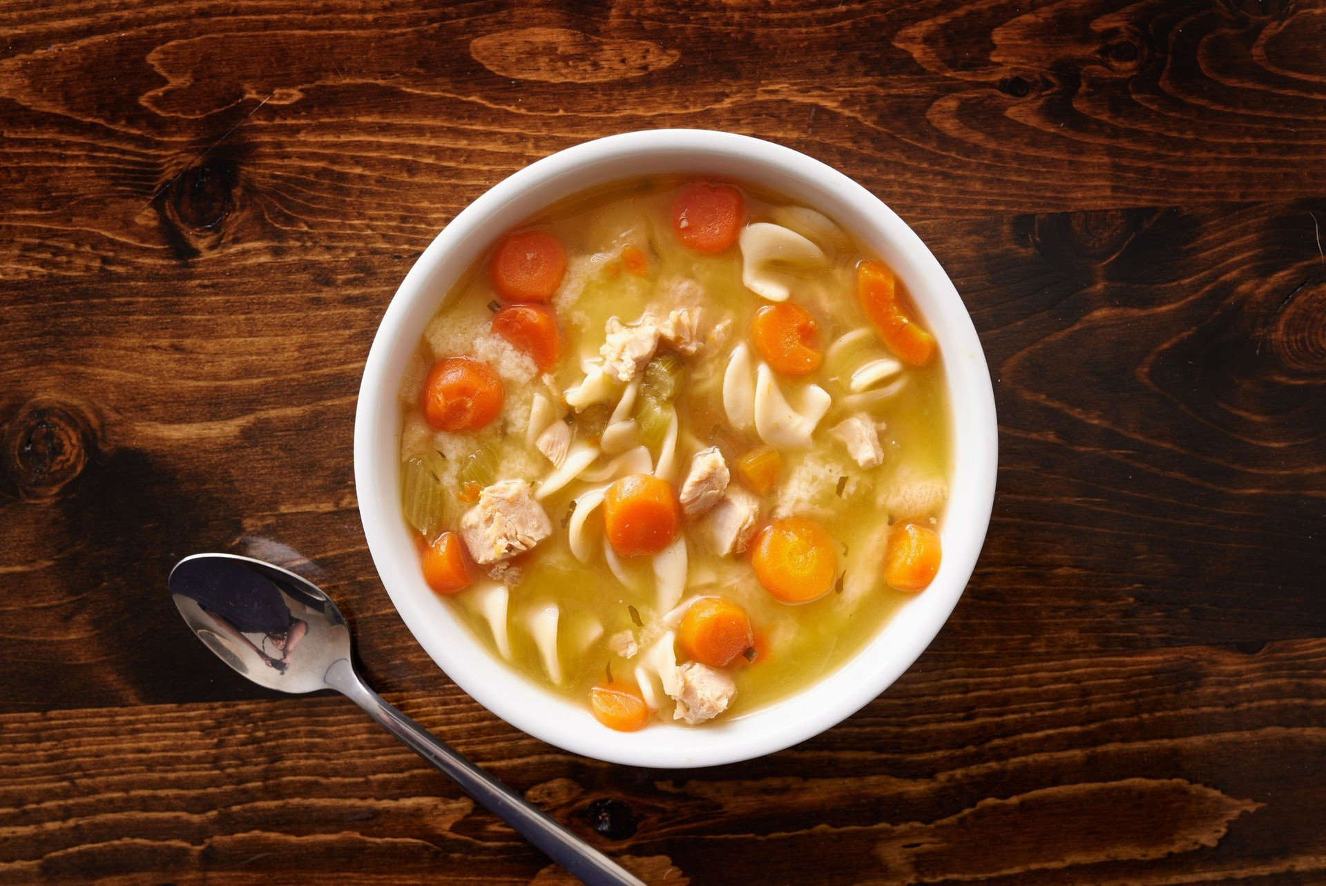 bowl-of-chicken-noodle-soup-shot-top-down-royalty-free-image-485348660-1534446739-17014263132681341840574.jpg