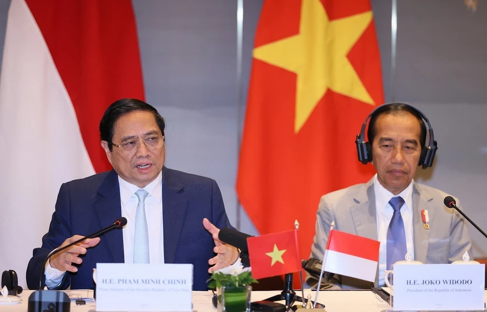 Thủ tướng Phạm Minh Chính phát biểu tại cuộc gặp doanh nghiệp hai nước. (Ảnh: Dương Giang/TTXVN)