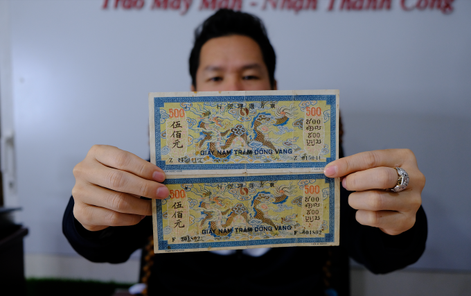 Hai tờ tiền mệnh giá 500 đồng của Đông Dương phát hành năm 1942-1945 được anh Chính sở hữu. Ảnh: Quỳnh Nguyễn