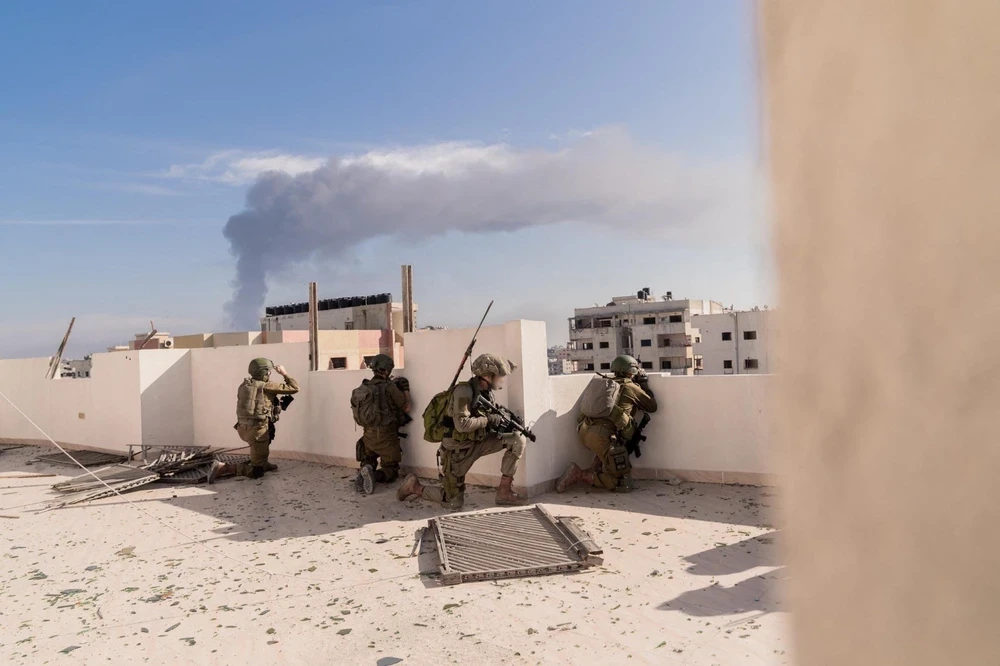 Binh sỹ Israel triển khai tại Gaza, ngày 21/12/2023. (Ảnh: AFP/TTXVN)