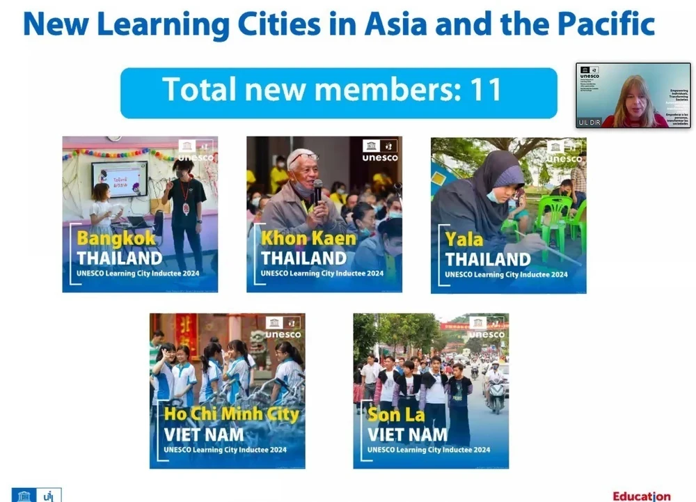 Màn hình thời điểm công bố 2 thành phố của Việt Nam là Thành phố Hồ Chí Minh và thành phố Sơn La, tỉnh Sơn La được công nhận là thành viên “Mạng lưới thành phố học tập toàn cầu”. (Ảnh: TTXVN phát)
