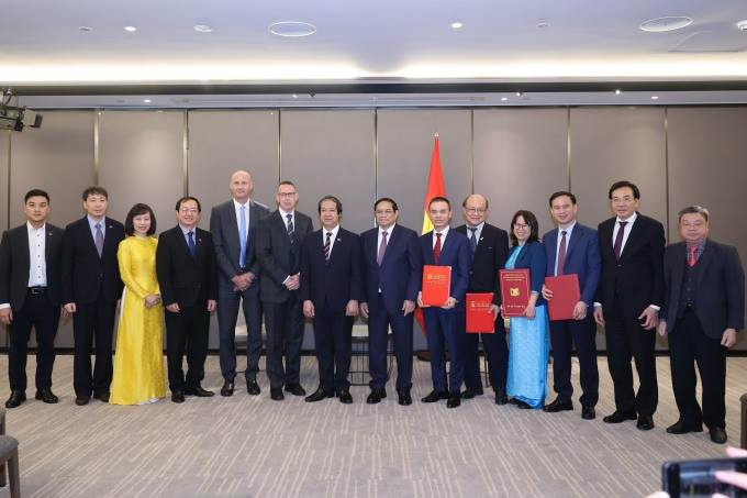 Thủ tướng chứng kiến trường Waikato và các trường đại học của Việt Nam trao đổi 4 thỏa thuận hợp tác trong giáo dục, đào tạo. Ảnh: Nhật Bắc