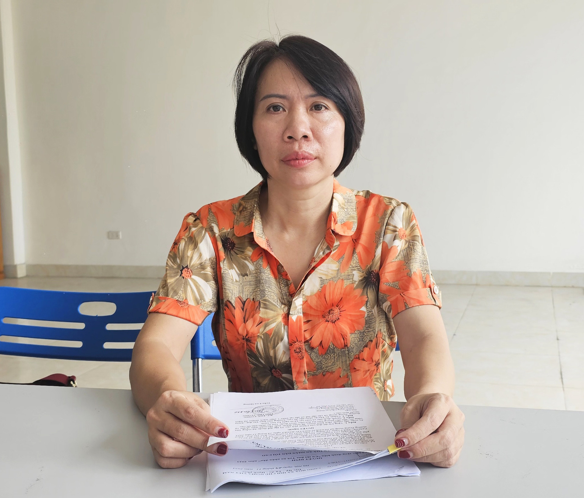 Bà Phạm Thị Thủy có đơn trình báo về việc bị lừa đảo số tiền lên tới hơn 14,7 tỉ đồng khi tham gia nạp tiền vào một tài khoản trên mạng - Ảnh: T. THẮNG
