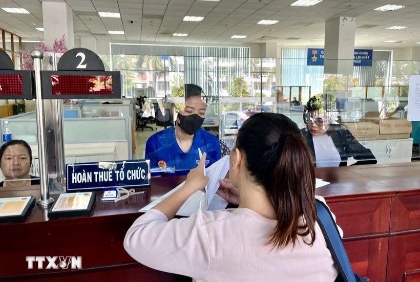 Ngành thuế Thành phố Hồ Chí Minh đẩy mạnh công tác hoàn thuế để hỗ trợ doanh nghiệp, nuôi dưỡng nguồn thu. (Ảnh: TTXVN) z5512357822156_e19f9c7287cba49c445b5244f66bfc4d.jpg