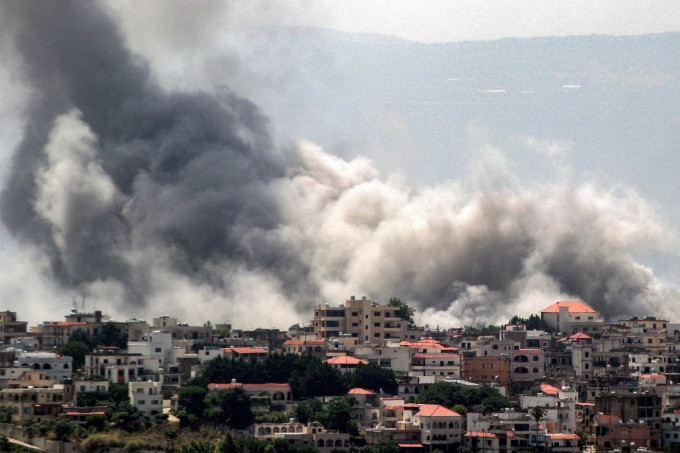 Khói bốc lên ở khu vực biên giới miền nam Lebanon ngày 18/6. Ảnh: AFP
