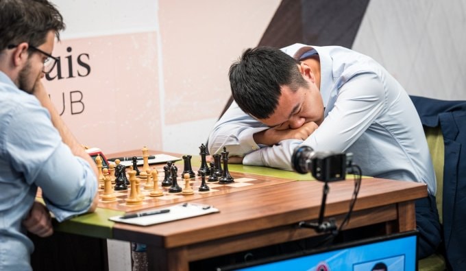 Đinh Lập Nhân trong ván đấu với Maxime Vachier-Lagrave tại vòng 9 Sinquefield Cup ở thành phố Saint Louis, bang Missouri, Mỹ ngày 28/8/2024. Ảnh: GCT