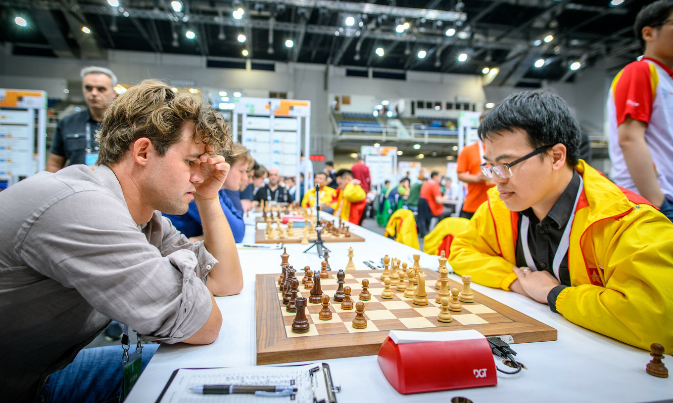 quang lie m carlsen.jpeg