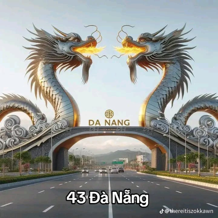 Hai con rồng phun lửa của cầu Rồng - một trong những hình ảnh để nhận diện Đà Nẵng - được đưa vào thiết kế cổng chào.