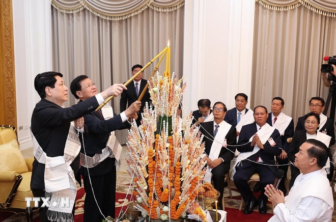 ttxvn-chu-tich-nuoc-buoc-chi-tay-viet-nam-lao-4.jpg