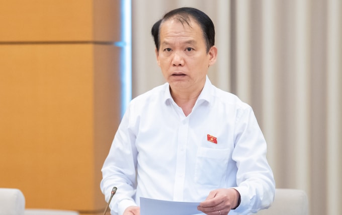 Chủ nhiệm Ủy ban Pháp luật và Tư pháp Hoàng Thanh Tùng, đại diện cơ quan thẩm tra. Ảnh: Cổng TTĐT Quốc hội