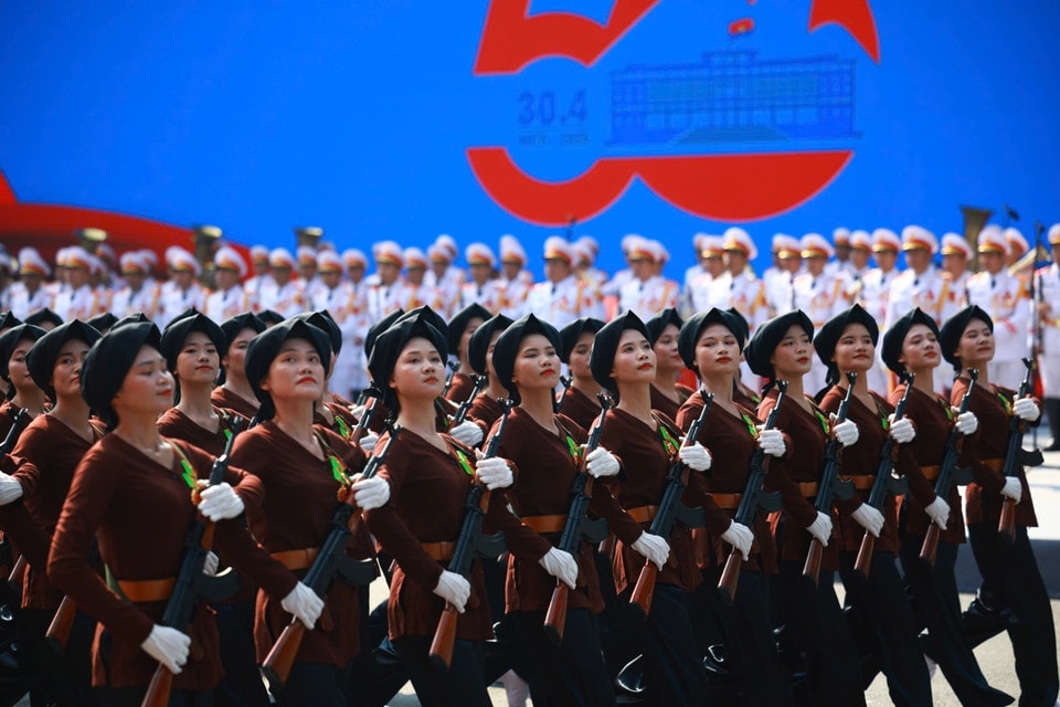 The female Northern Militia troops march past the grandstand. Photo: VNA