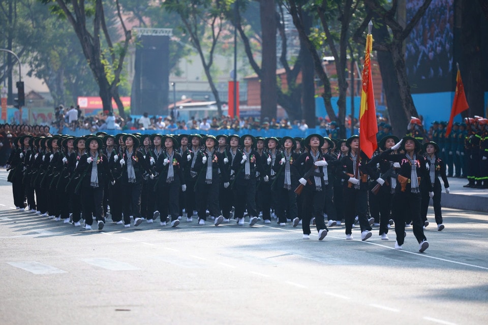 The female Southern Guerrilla fighters march past the grandstand. Photo: VNA