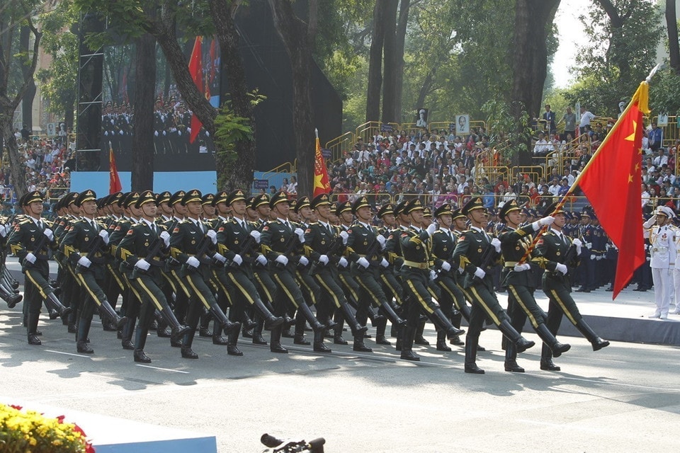  The Chinese People's Liberation Army marches past the grandstand. Photo: VNA