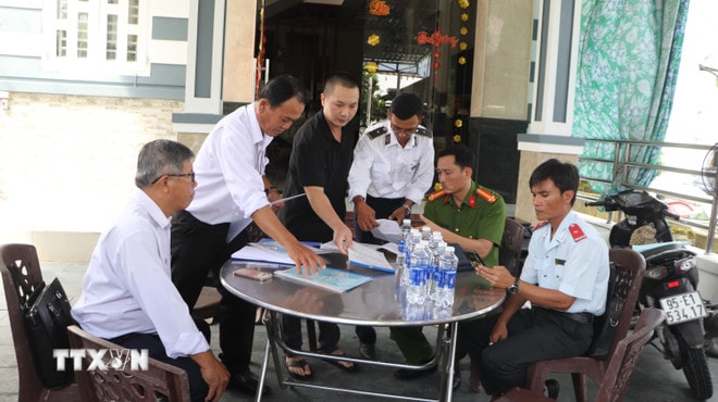 ttxvn-kiem-tra-2-co-so-giet-mo-gia-cong-cho-cty-co-phan-chan-nuoi-cp-viet-nam-8068950.jpg