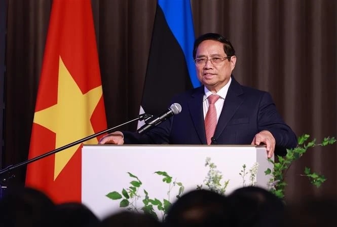 Prime Minister Pham Minh Chinh speaks at the Vietnam–Estonia business forum. (Photo: VNA(