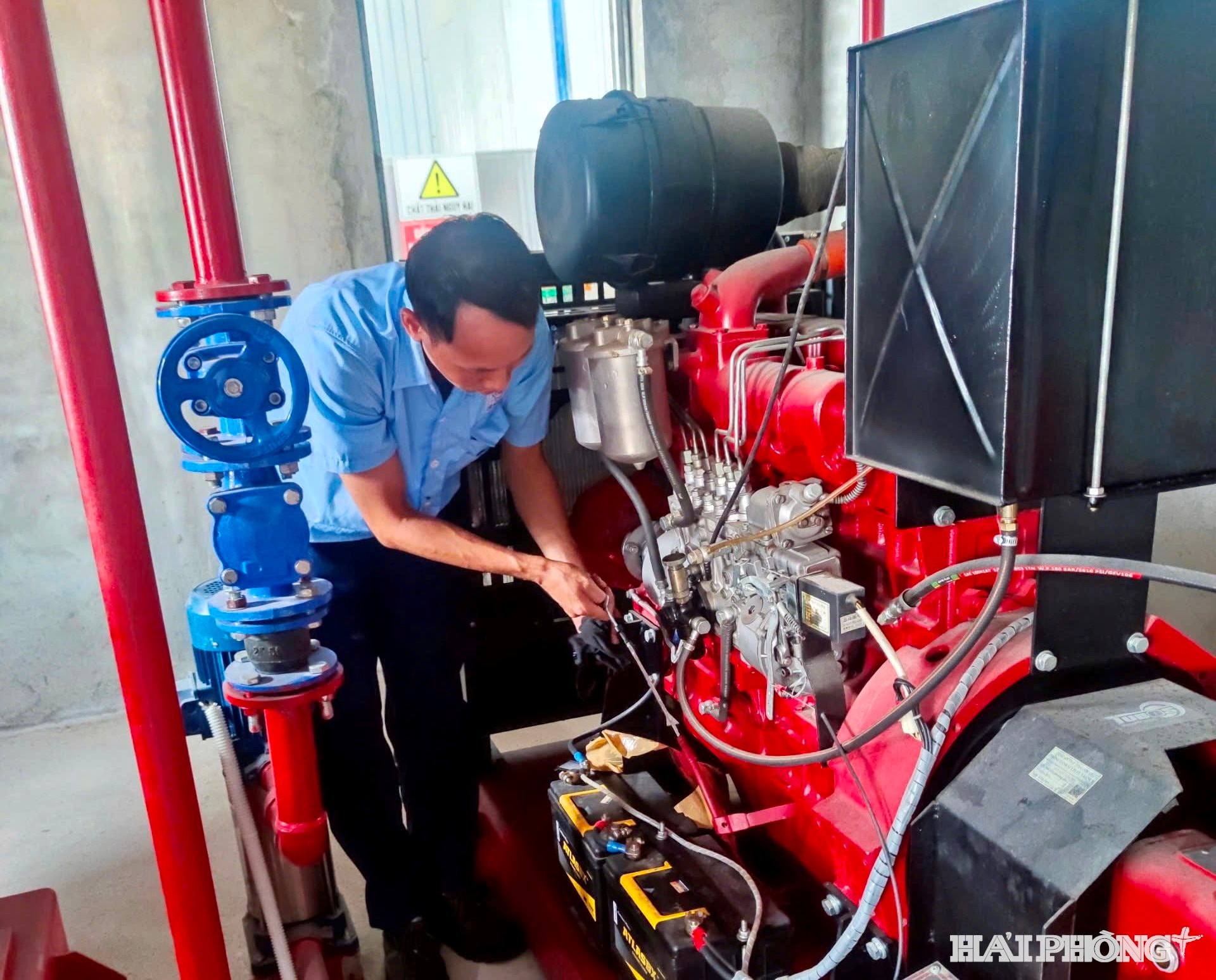 Workers recheck the fire protection system to prevent explosions when storm No. 3 makes landfall.