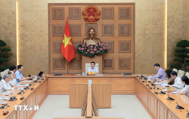 ttxvn-pho-thu-tuong-ho-duc-phoc-chu-tri-hop-hoi-dong-tu-van-chinh-sach-tien-te-quoc-gia-quy-ii-8196696-2.jpg