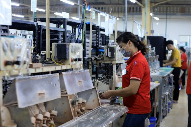 Dây chuyền sản xuất hàng xuất khẩu của doanh nghiệp trong nước. (Ảnh: PV/Vietnam+) 167a6512-7982.jpg