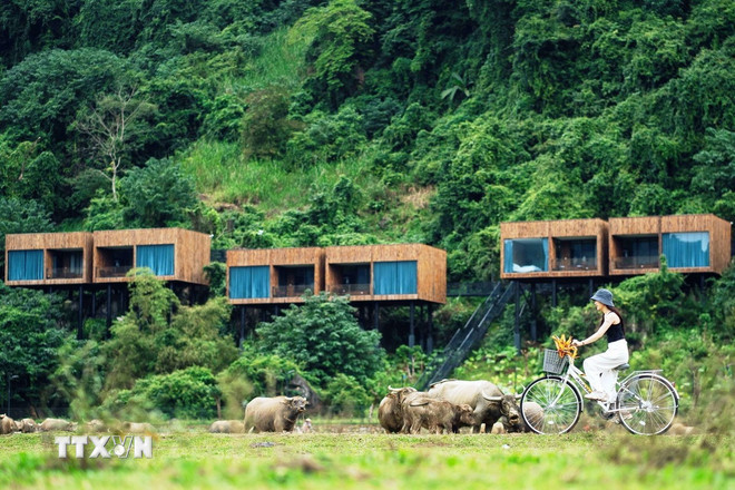Mô hình du lịch cộng đồng ở làng Tân Hóa (Quảng Trị). (Ảnh: TTXVN phát) ttxvn-2010-lang-tan-hoa.jpg