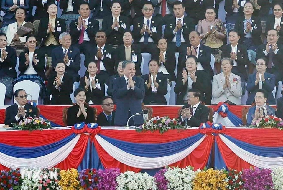 Tổng Bí thư Tô Lâm và Phu nhân dự Lễ kỷ niệm 50 năm Quốc khánh Lào- Ảnh 1.