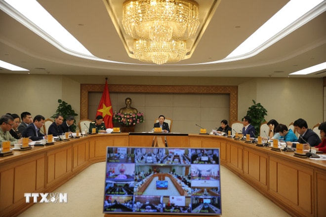 Quang cảnh cuộc họp. (Ảnh: Diệp Trương/TTXVN) ttxvn-pho-thu-tuong-tran-hong-ha-hop-thao-go-kho-khan-vuong-mac-trong-to-chuc-thi-hanh-luat-dat-dai-8495270-1.jpg