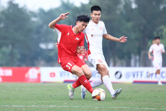 Đương kim vô địch PVF (áo đỏ) sẽ có hành trình bảo vệ ngôi vương được dự báo nhiều khó khăn. (Ảnh: VFF) z7385560942543-0e2701ecdbcfbadac71892f075fd1482.jpg