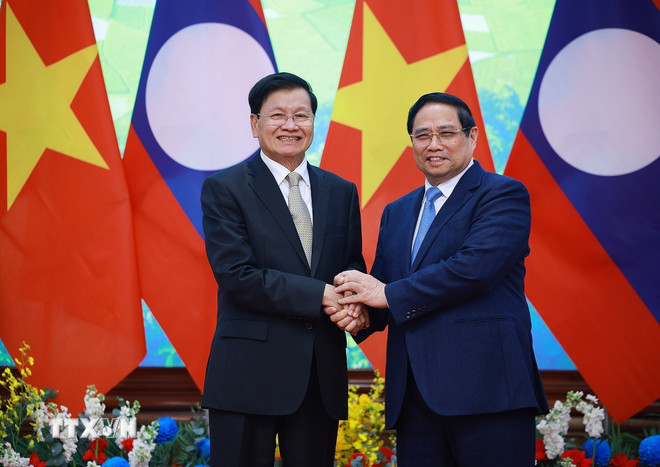 Thủ tướng Phạm Minh Chính hội kiến Tổng Bí thư, Chủ tịch nước Lào Thongloun Sisoulith. (Ảnh: Dương Giang/TTXVN) ttxvn-thu-tuong-hoi-kien-tong-bi-thu-chu-tich-nuoc-lao-thongloun-sisoulith-8552248-4.jpg
