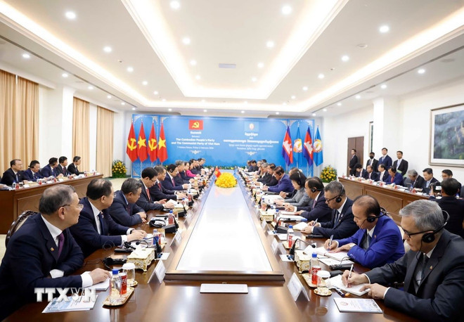 Tổng Bí thư Tô Lâm và Chủ tịch Đảng Nhân dân Campuchia Hun Sen đồng chủ trì Hội đàm song phương giữa Đảng Cộng sản Việt Nam và Đảng Nhân dân Campuchia. (Ảnh: Thống Nhất/TTXVN) ttxvn-hoi-dam-giua-dang-cong-san-viet-nam-va-dang-nhan-dan-campuchia-0602-1.jpg
