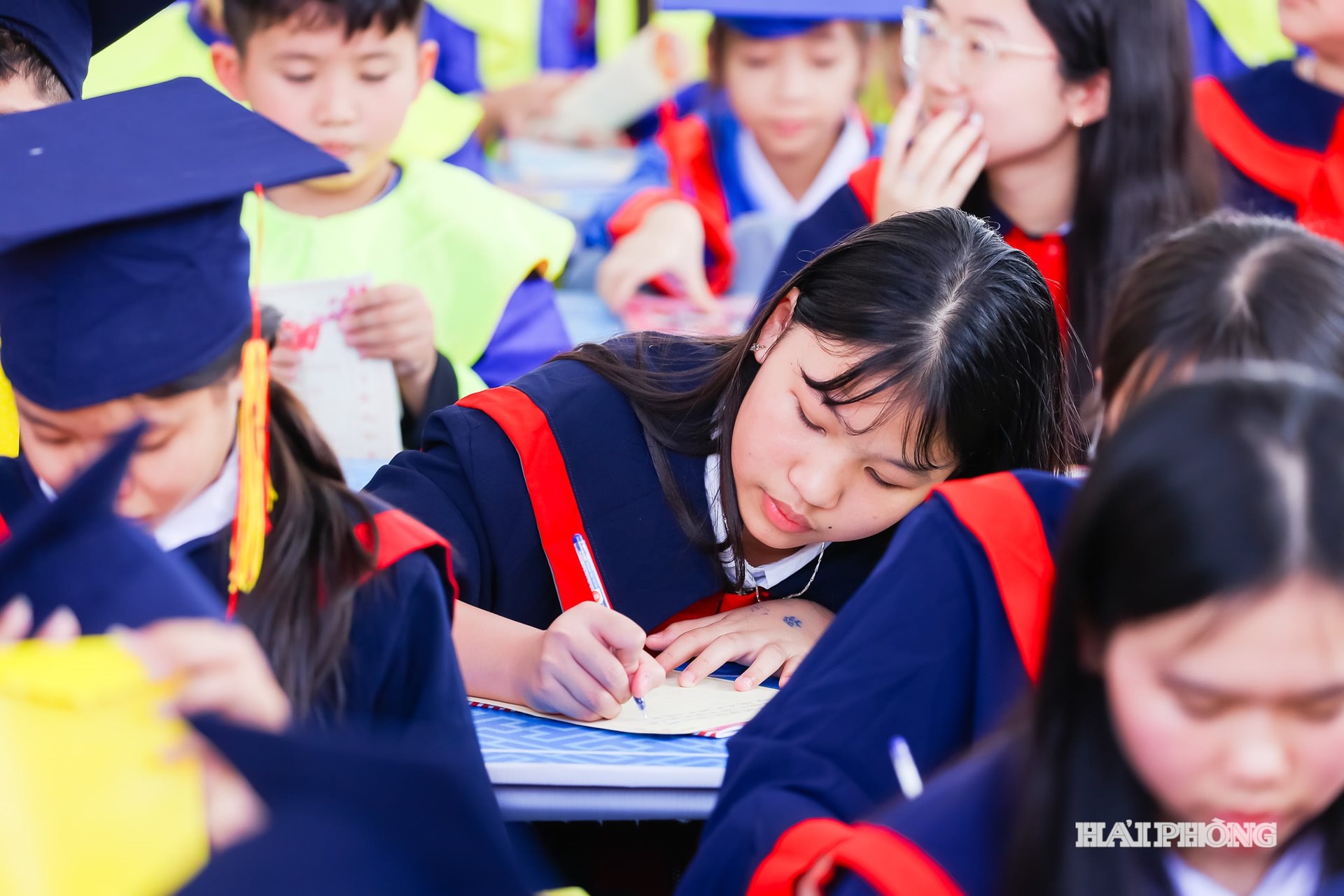 Students performed the traditional first-writing ritual of the Lunar New Year.